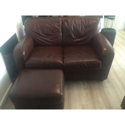 Two brown leather sofas and foot stall for sale