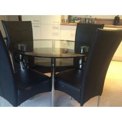 Glass Table with 4 chairs. Good Condition