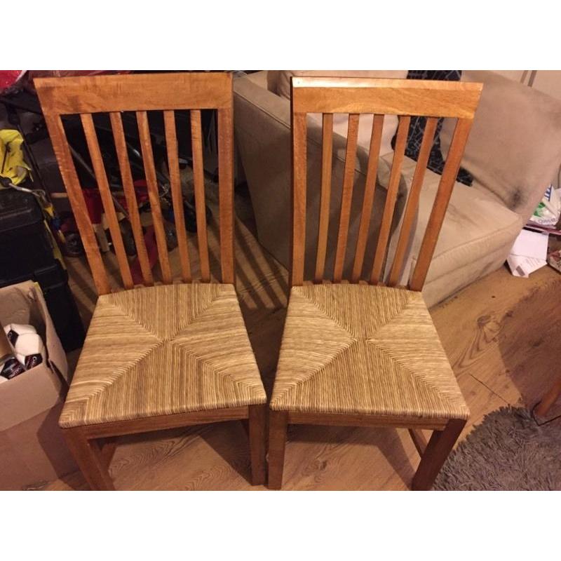 2 high back wooden chairs