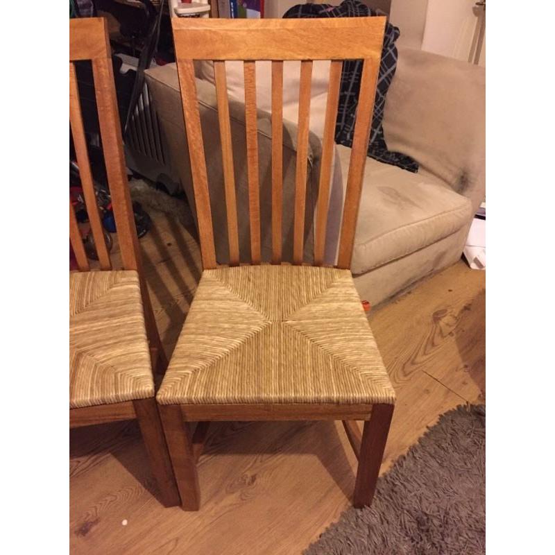 2 high back wooden chairs