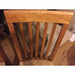 2 high back wooden chairs