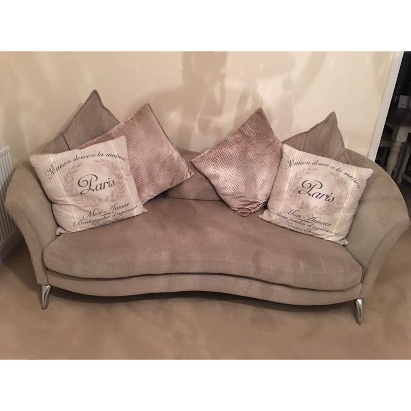 Four seater sofa and chair