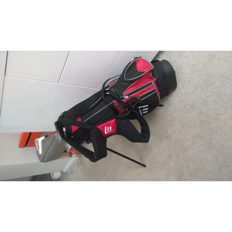 A delightful part set of children's golf clubs including golf bag.