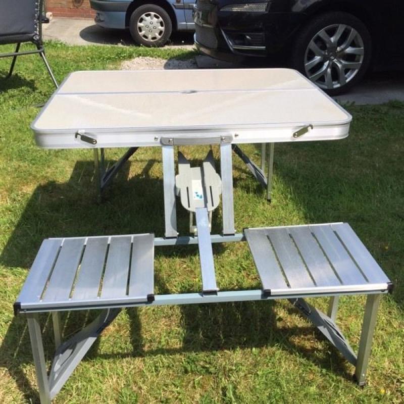 Aluminium folding table and chairs.