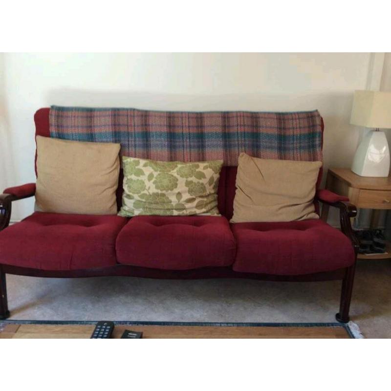 Three piece red sofa suite