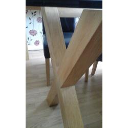 Oak and glass dinning table with 6 chairs