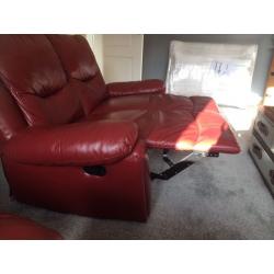 Red leather reclining sofa