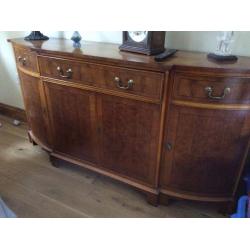 Large ornate sideboard, with angled sides.