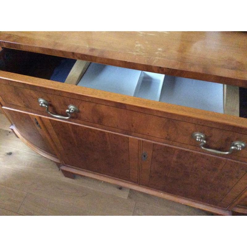 Large ornate sideboard, with angled sides.