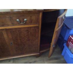 Large ornate sideboard, with angled sides.