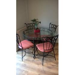 Wrought Iron table and 4 chairs