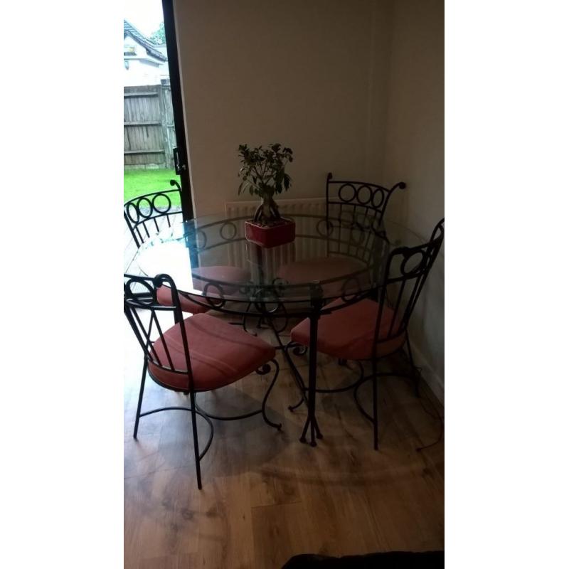 Wrought Iron table and 4 chairs