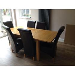 Large extendable table with 6 chairs