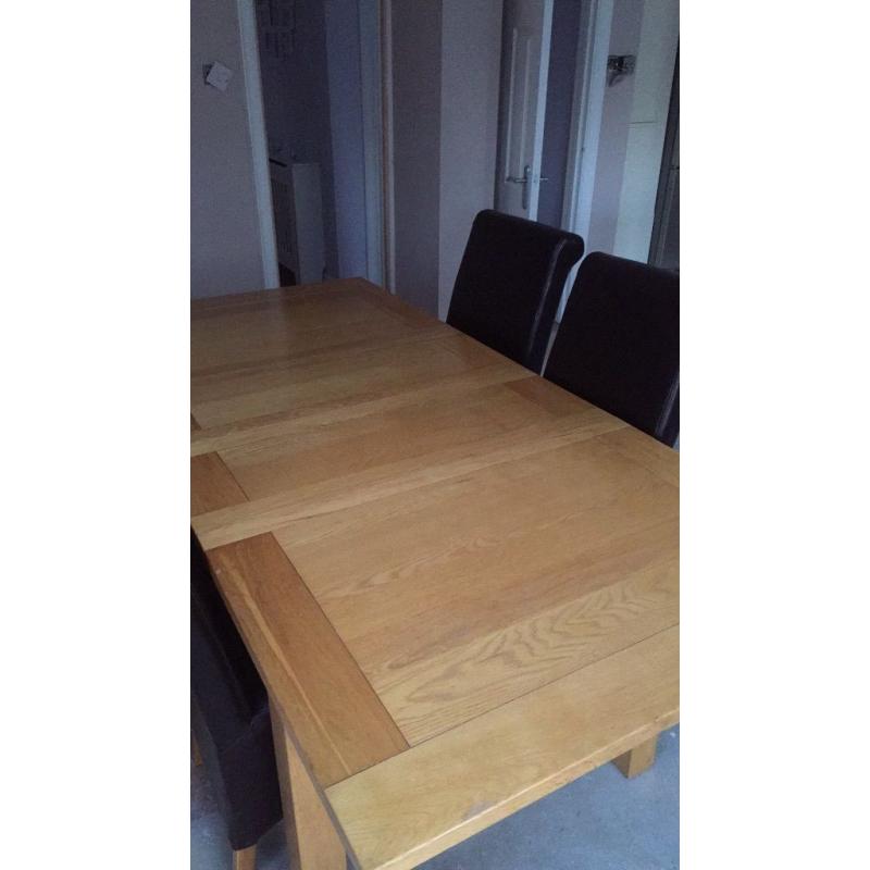 Large extendable table with 6 chairs