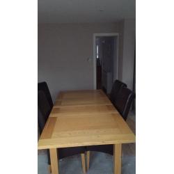 Large extendable table with 6 chairs