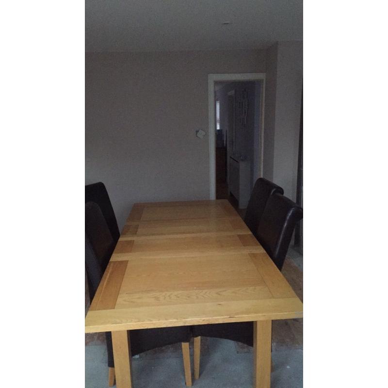 Large extendable table with 6 chairs