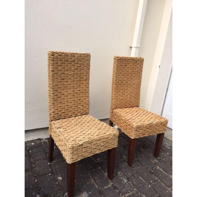 2 wicker chairs with dark wood legs. Collect from Putney