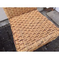 2 wicker chairs with dark wood legs. Collect from Putney