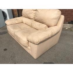 LEATHER 2 SEATER BIG SOFA PRE-OWNED VERY COMFY & SOFT NO RIPS OR TEARS FREE DELIVERY MCR......