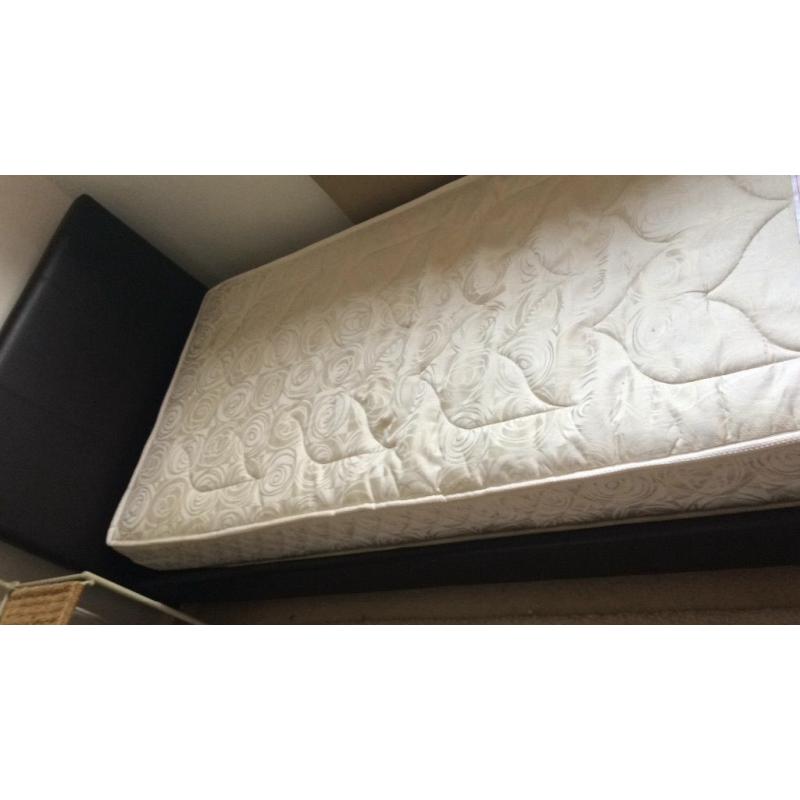 Single bed and mattress brown faux leather as new. Used as a guest bed. Immaculate condition.