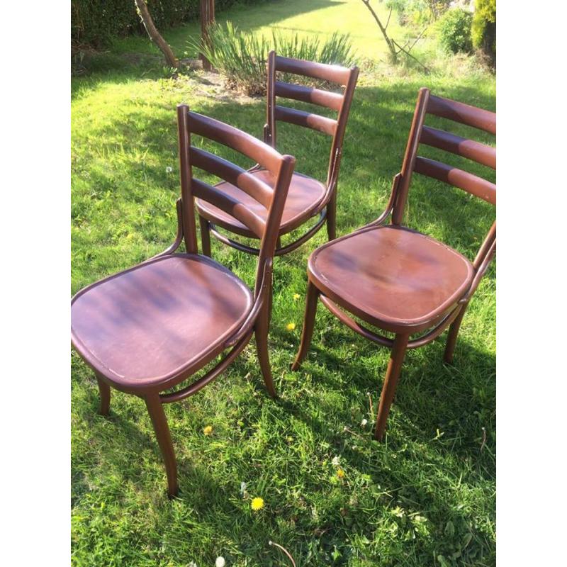 Four Wood chairs for sale