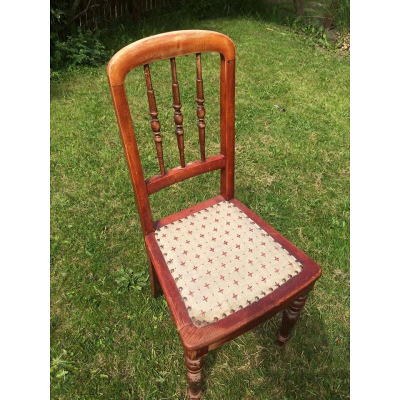 Four Wood chairs for sale