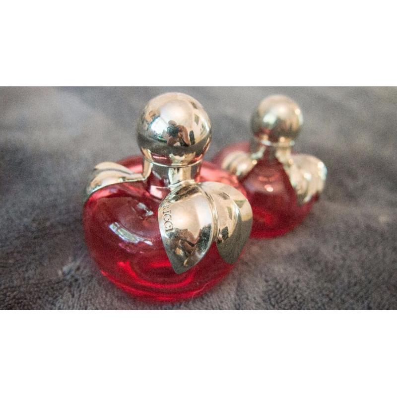 Nina by Nina ricci. Empty bottles, large and medium.