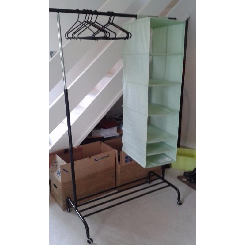 Coat stand and green storage with compartment