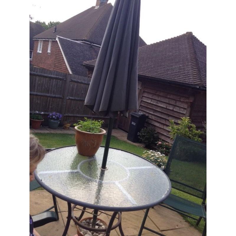 Garden table , chairs umbrella