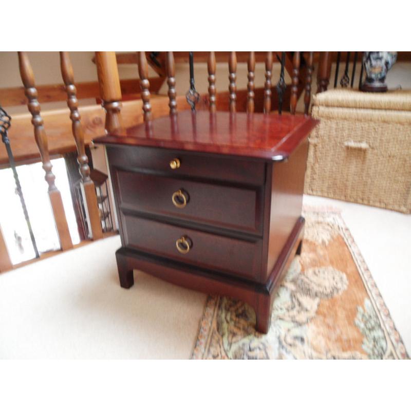 Pair of stag mahogany 2 drawer bedside cabinets, plus third not stag. Strong and servicable .