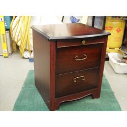 Pair of stag mahogany 2 drawer bedside cabinets, plus third not stag. Strong and servicable .