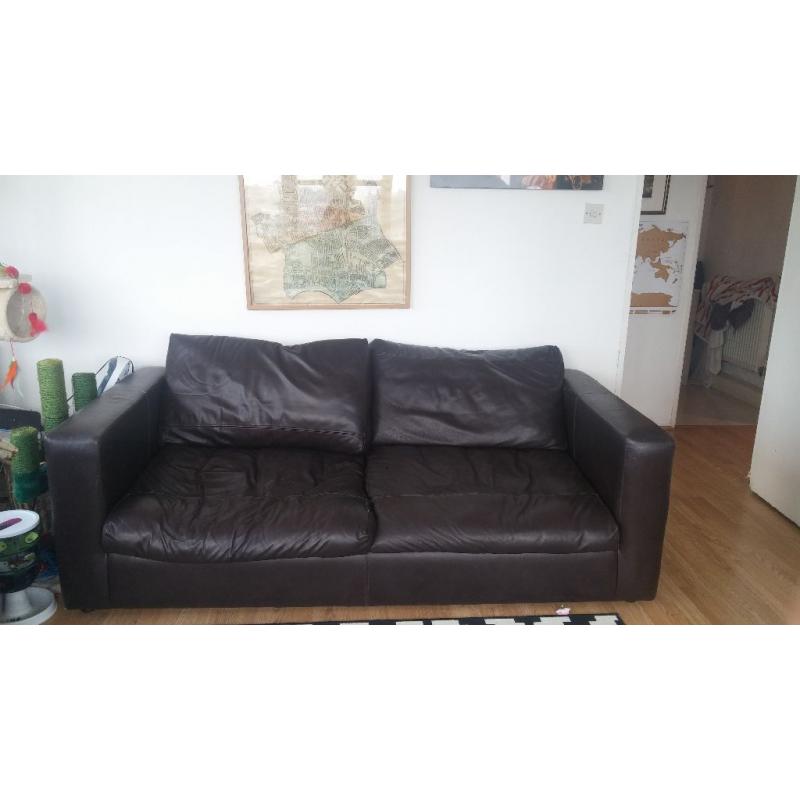 Large dark leather couch, very comfy! Collection only in Clapham junction