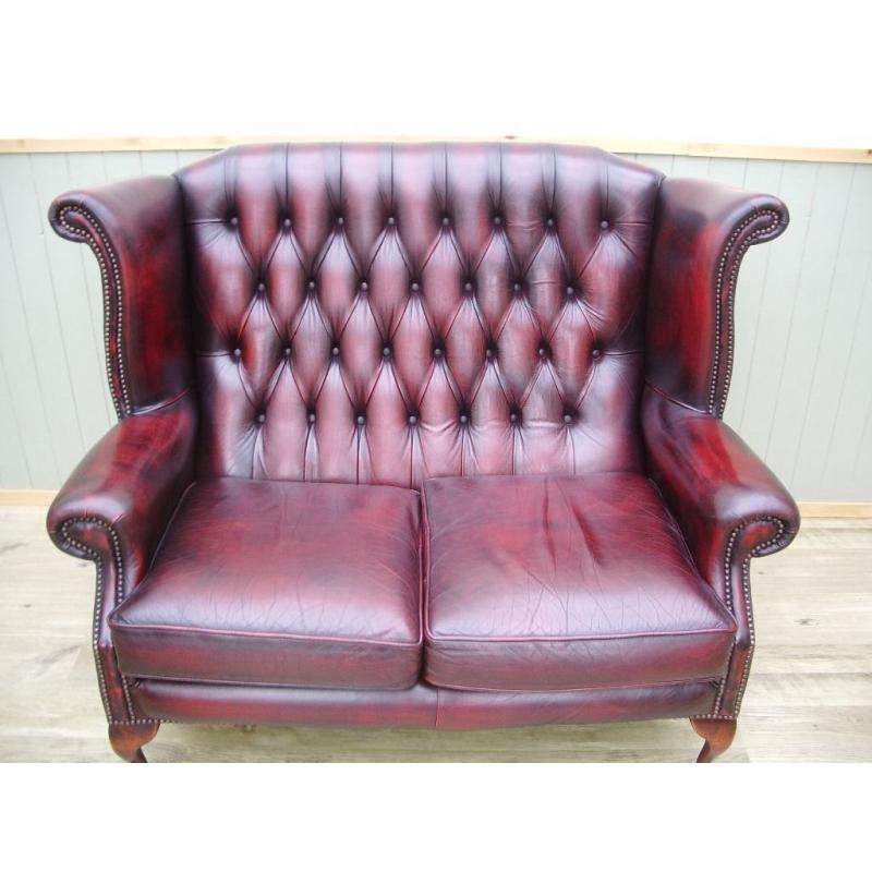 Oxblood leather Chesterfield Queen Anne 2 Seater Sofa.