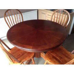 Dark wood dining table and chairs