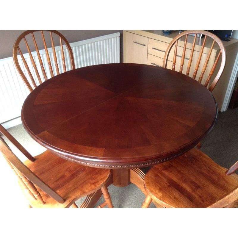 Dark wood dining table and chairs