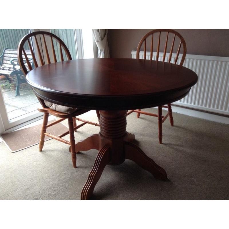 Dark wood dining table and chairs