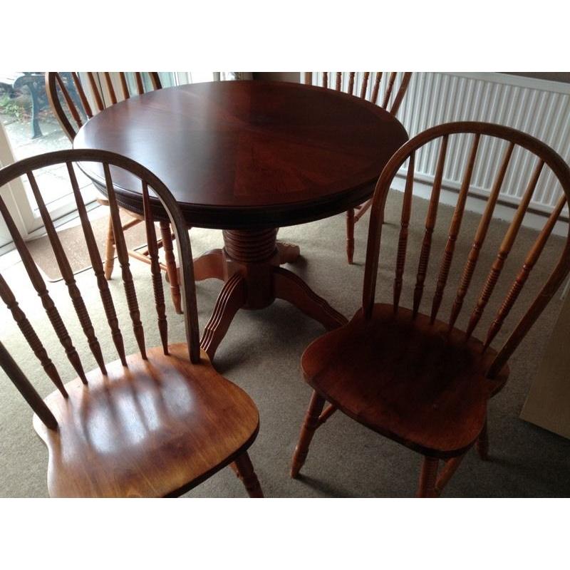 Dark wood dining table and chairs