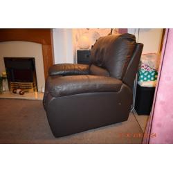 2 Faux Leather Brown Manual Reclining Chairs.