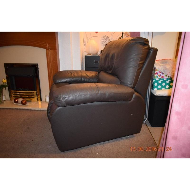 2 Faux Leather Brown Manual Reclining Chairs.