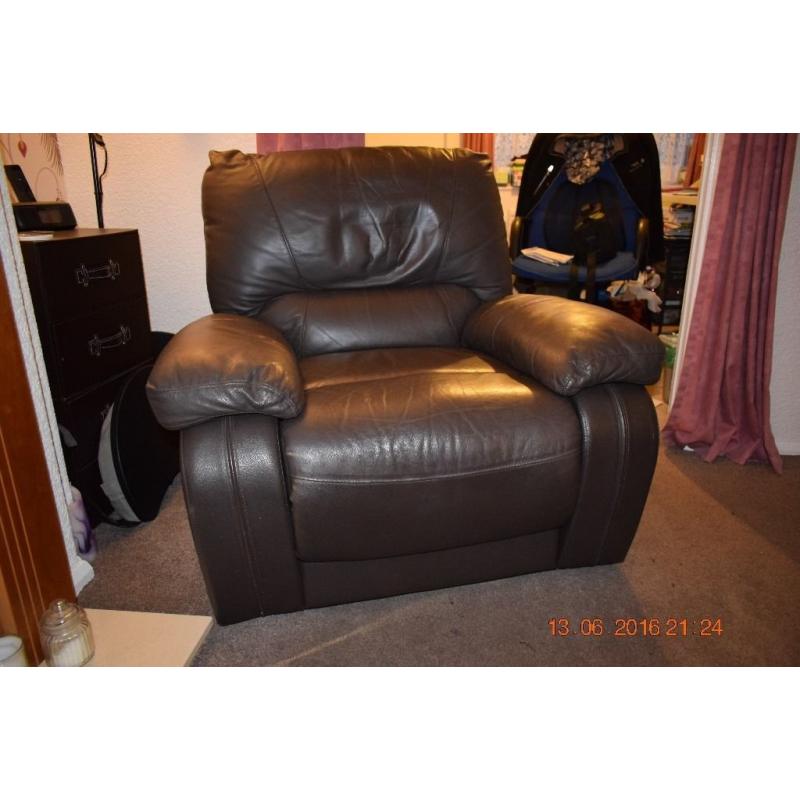 2 Faux Leather Brown Manual Reclining Chairs.