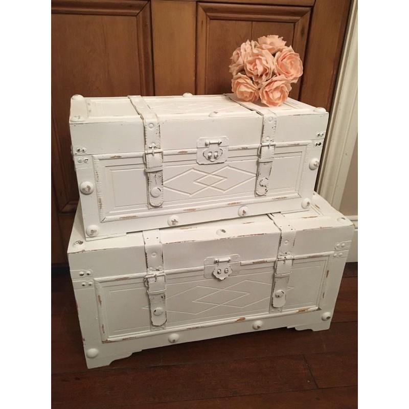 Set of white painted and distressed wood Trunks