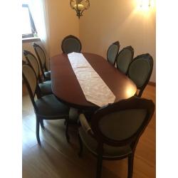 Mahogany extendable dining table and 8 velvet chairs