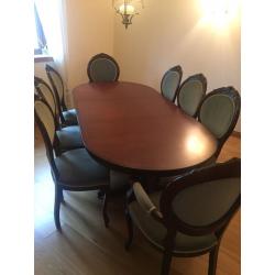 Mahogany extendable dining table and 8 velvet chairs