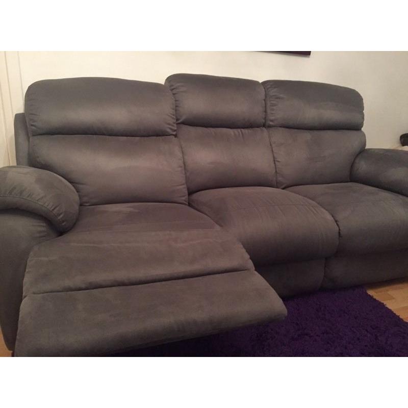 Grey recliner couch 3x 2 and puffet aswell !