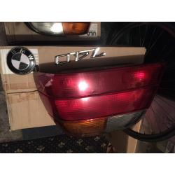 BMW 740 E38 REAR TAIL LIGHTS AND 740 BMW WHITE AND BLACK BADGE