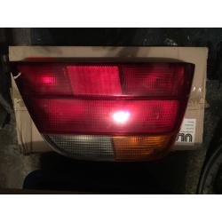 BMW 740 E38 REAR TAIL LIGHTS AND 740 BMW WHITE AND BLACK BADGE