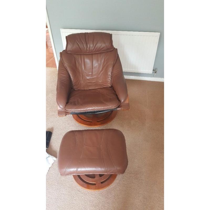 Brown leather chair with footstool