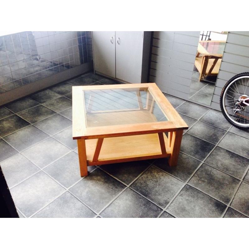 Next wooden coffeetable with glass top