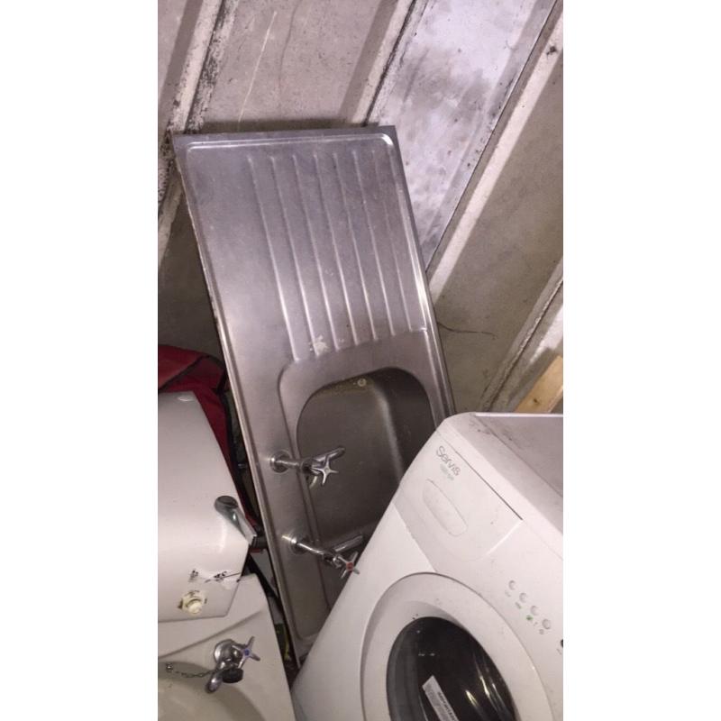 Used beds 5 doors and a kitchen sink washing machine