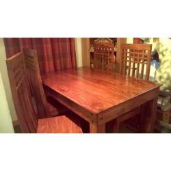 Sheesham wood table and four chairs